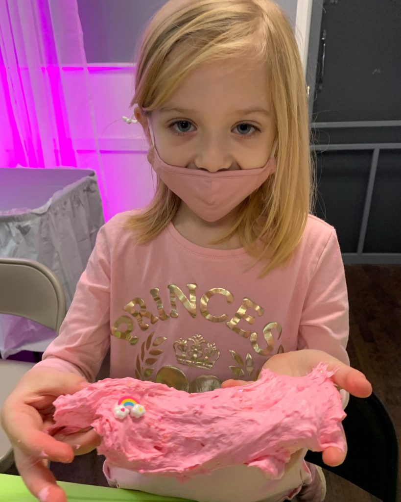 Girl showing pink slime