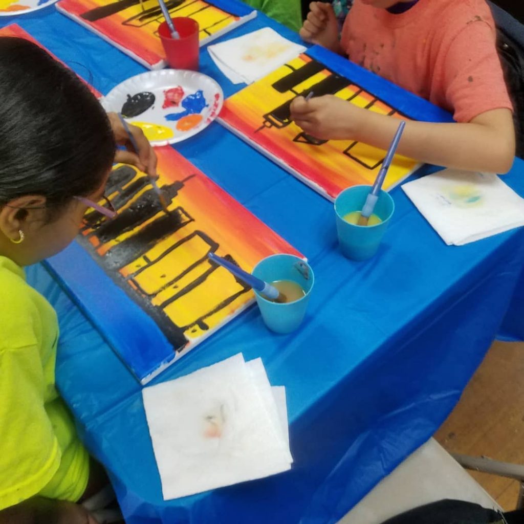 Children painting cityscape canvas painting