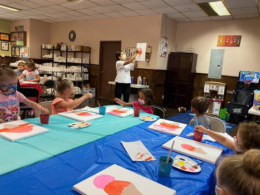 Canvas painting party kids in masks